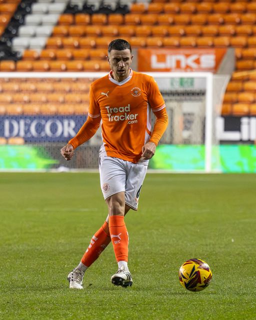 Oliver Norburn of Blackpool passes the ball during the The Vertu Trophy match Blackpool vs Aston Villa U21 at Bloomfield Road, Blackpool, United Kingdom, 17th December 2024

(Photo by Craig Thomas/News Images)