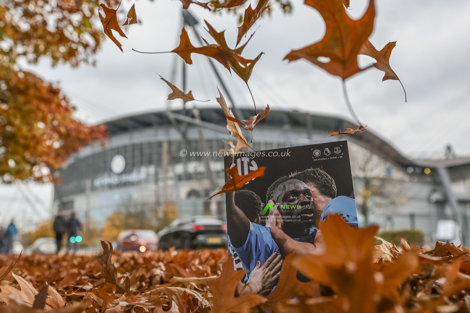 Autumn leaves fall over todays official match day program with Jeremy Doku of Manchester City on the front cover during the Premier League match Manchester City vs Everton at Etihad Stadium, Manchester, United Kingdom, 18th October 2025

(Photo by Mark Cosgrove/News Images)