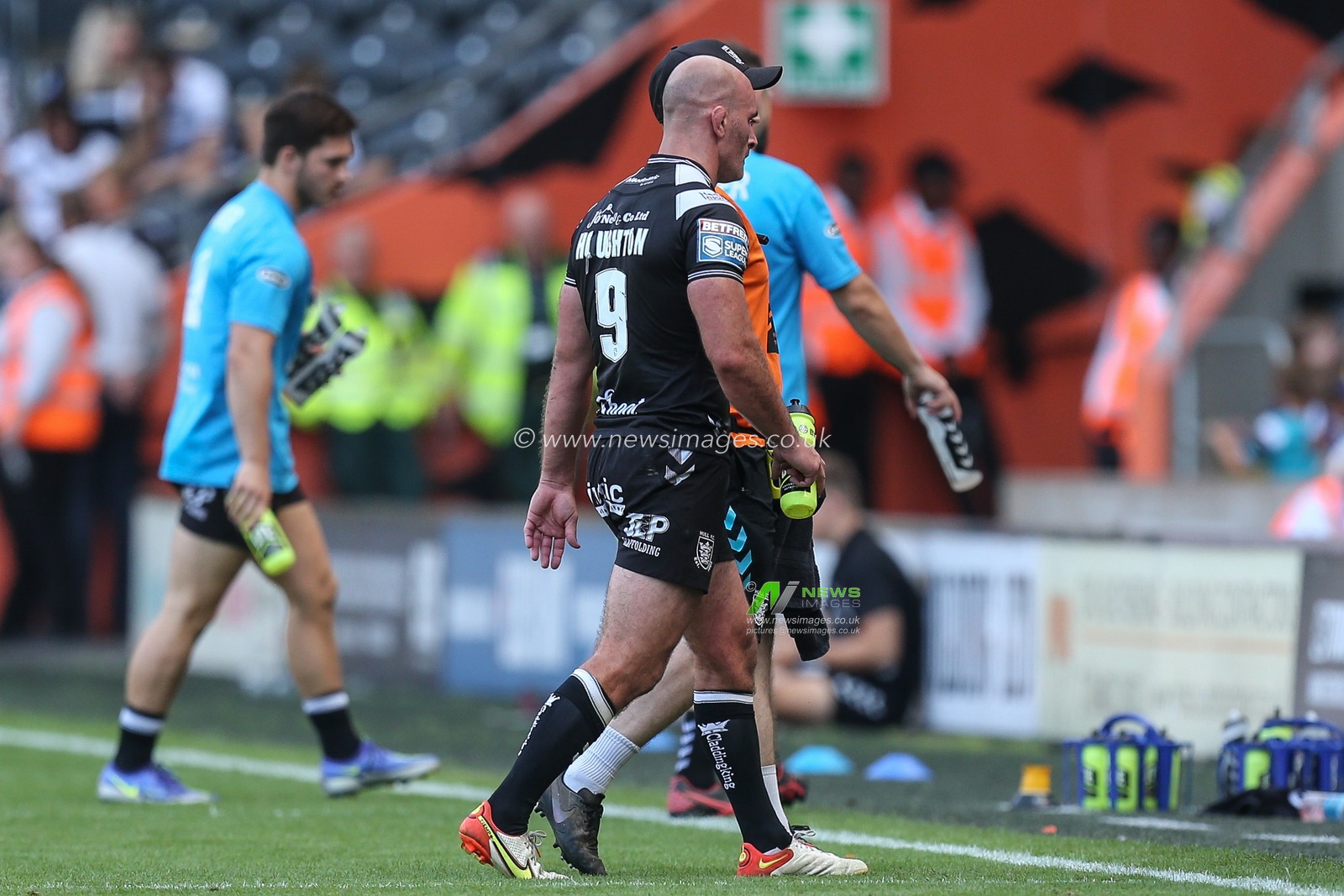 Danny Houghton #9 of Hull FC goes off the pitch for a HIA