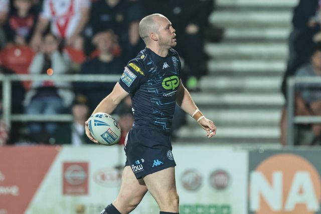 Liam Marshall of Wigan Warriors celebrates his try during the Betfred Super League Round 25 match St Helens vs Wigan Warriors at Totally Wicked Stadium, St Helens, United Kingdom, 5th September 2025

(Photo by Mark Cosgrove/News Images)