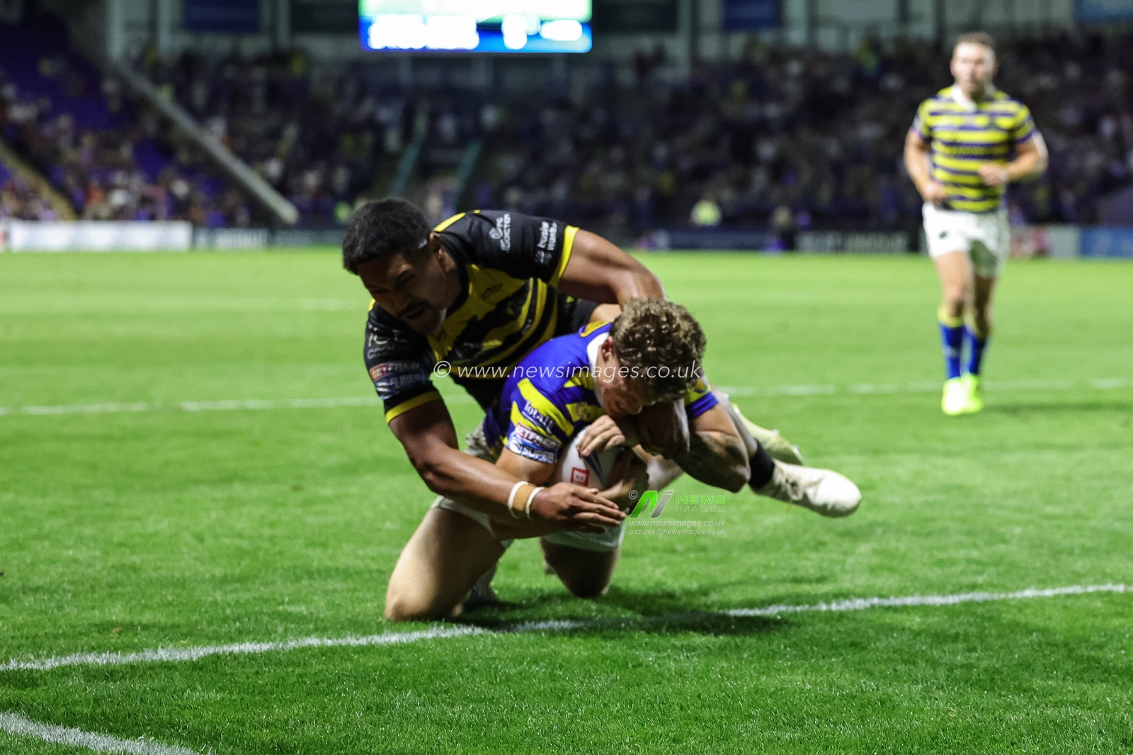 Arron Lindop of Warrington Wolves goes over for a try during the Betfred Super League round 23 match Warrington Wolves vs York Knights at The Halliwell Jones Stadium, Warrington, United Kingdom on 13 August 2026

(Photo by Mark Cosgrove/News Images)