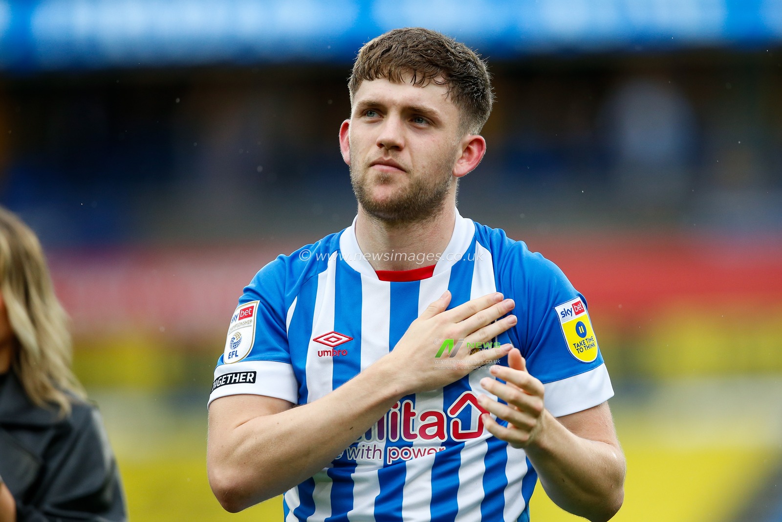 Ben Jackson #30 of Huddersfield Town taps the Huddersfield Town badge after the Sky Bet Championship match Huddersfield Town vs Reading at John Smith's Stadium, Huddersfield, United Kingdom, 8th May 2023

(Photo by Ben Early/News Images)