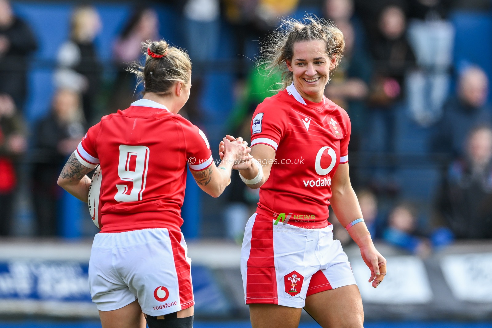 Kerin Lake and Keira Bevan of Wales hi five as they celebrate this sides try during the TikTok Womenâ€™s Six Nations match Wales vs Ireland at BT Cardiff Arms Park, Cardiff, United Kingdom, 25th March 2023

(Photo by Craig Thomas/News Images)