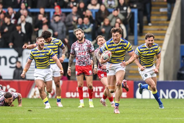 Matty Ashton of Warrington Wolves breaks with the ball to go over for a solo try during the Betfred Super League round 7 match Warrington Wolves vs Leigh Leopards at The Halliwell Jones Stadium, Warrington, United Kingdom on 04 April 2026

(Photo by Alfie Cosgrove/News Images)