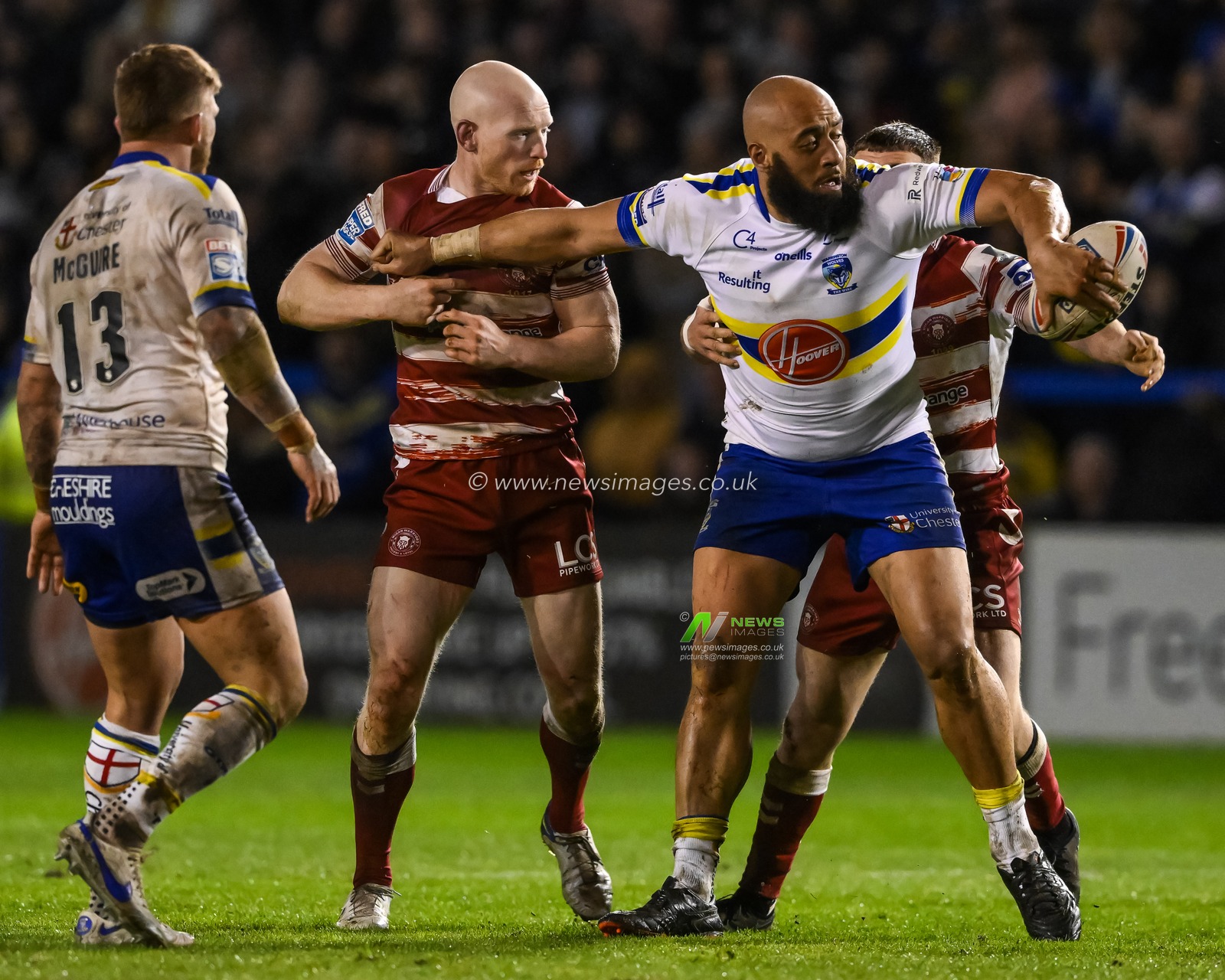 Sam Kasiano #14 of Warrington Wolves tries to offload the ball during the Betfred Super League Round 9 match Warrington Wolves vs Wigan Warriors at Halliwell Jones Stadium, Warrington, United Kingdom, 14th April 2023

(Photo by Craig Thomas/News Images)