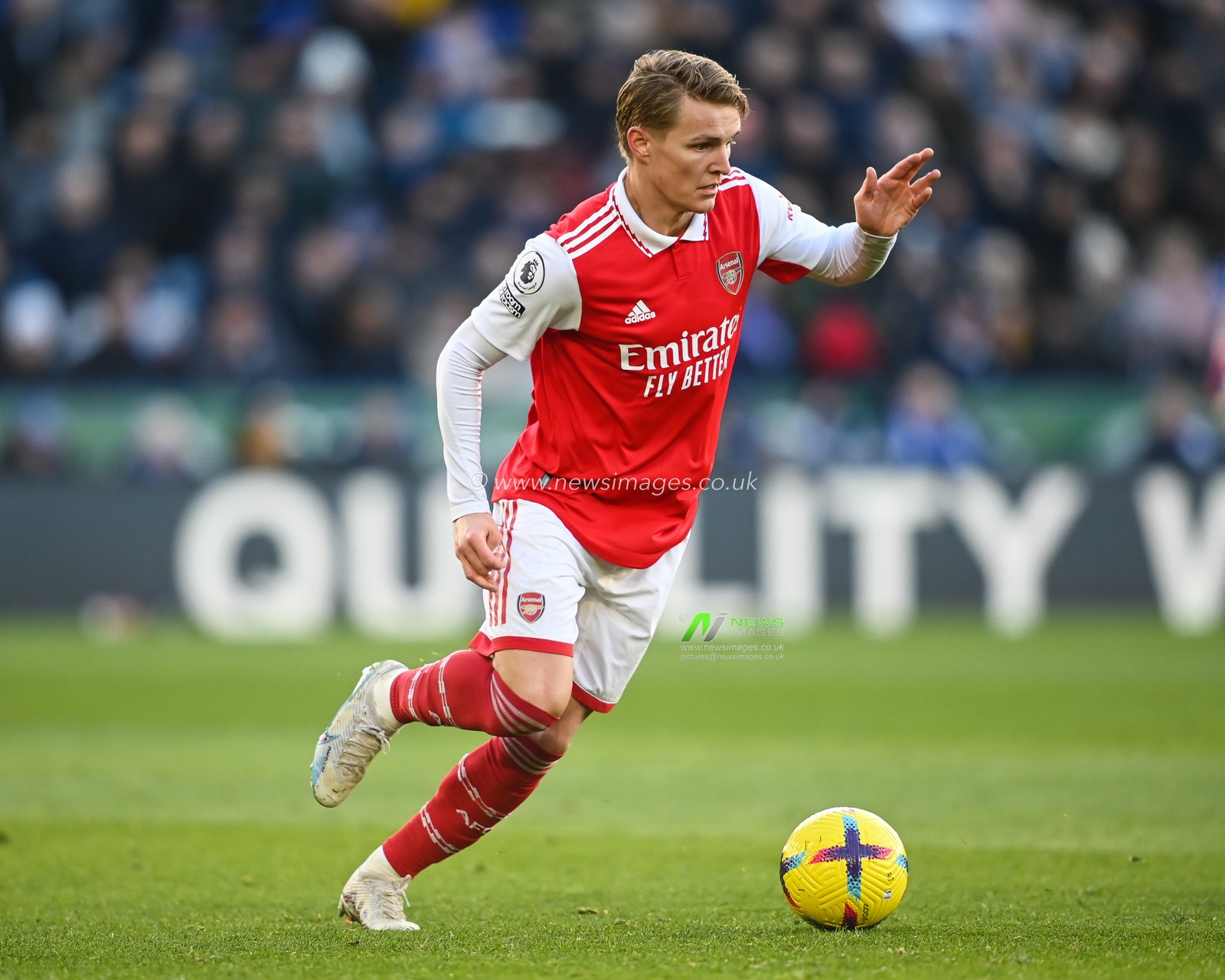 Martin Ã˜degaard #8 of Arsenal makes a break with the ball  during the Premier League match Leicester City vs Arsenal at King Power Stadium, Leicester, United Kingdom, 25th February 2023

(Photo by Craig Thomas/News Images)