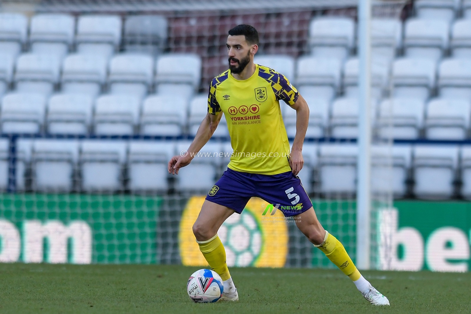 Alex Vallejo #5 of Huddersfield Town with the ball