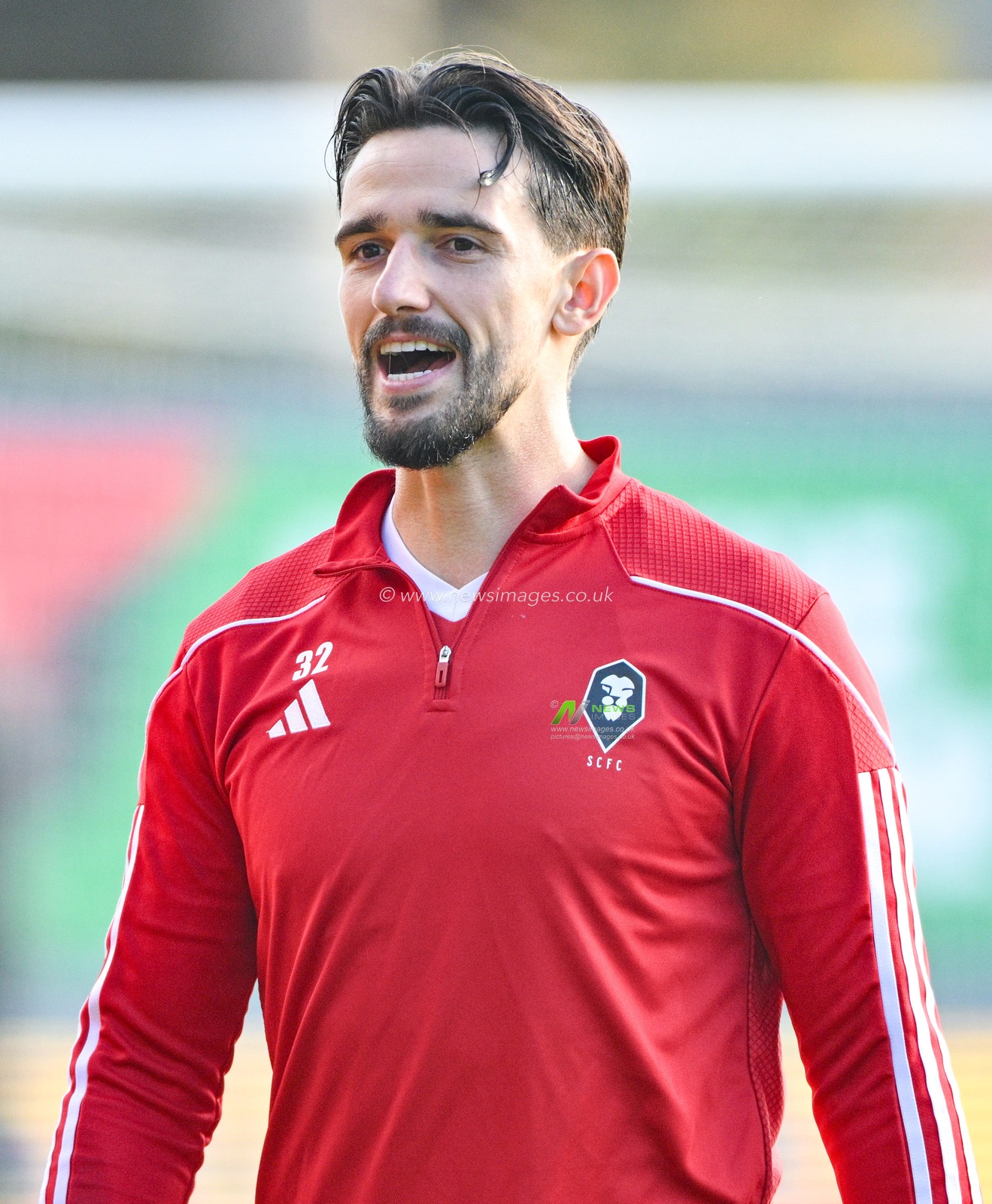Liam Shephard 32# of Salford City Football Club warms up, during the Sky Bet League 2 match Wrexham vs Salford City at SToK Cae Ras, Wrexham, United Kingdom, 14th October 2023

(Photo by Cody Froggatt/News Images)