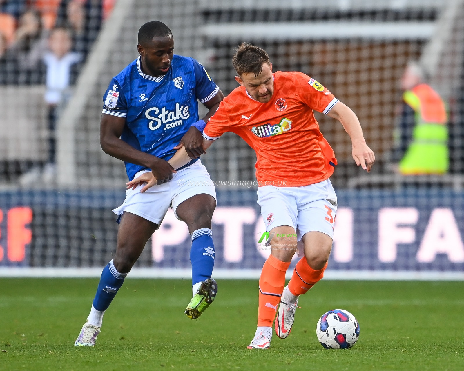 Jordan Thorniley #34 of Blackpool holds off Keinan Davis #7 of Watford during the Sky Bet Championship match Blackpool vs Watford at Bloomfield Road, Blackpool, United Kingdom, 8th October 2022

(Photo by Craig Thomas/News Images)