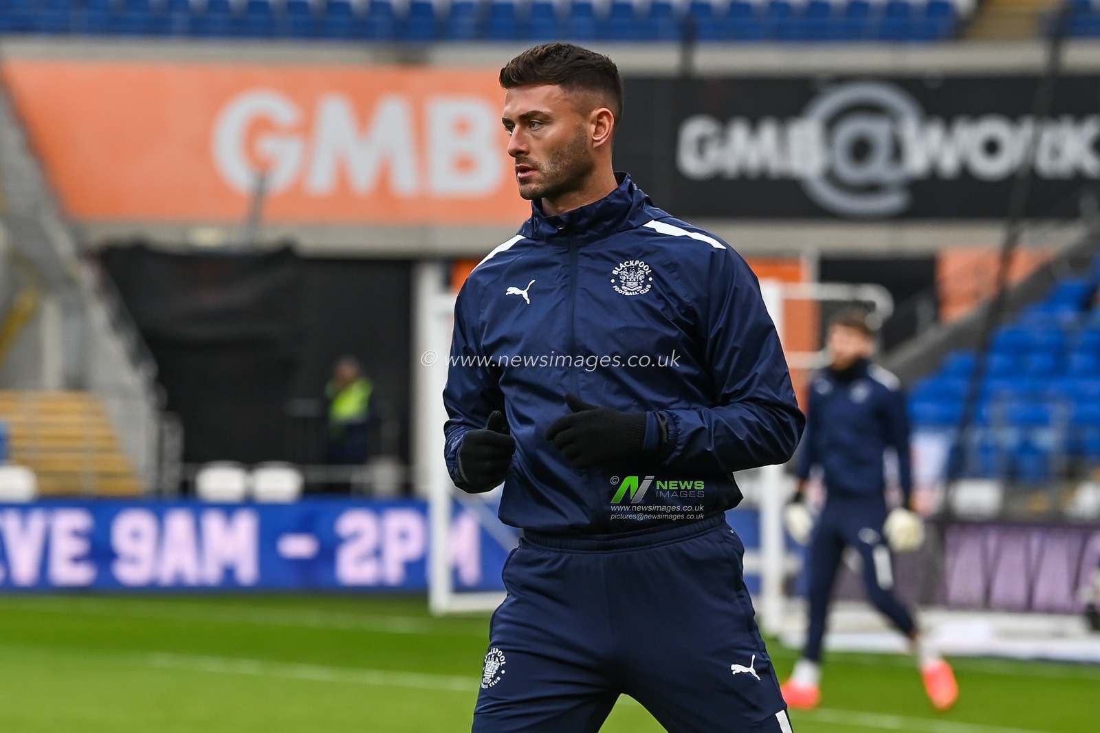 Gary Madine #14 of Blackpool during the pre-game warmup ahead of the Sky Bet Championship match Cardiff City vs Blackpool at Cardiff City Stadium, Cardiff, United Kingdom, 17th December 2022

(Photo by Craig Thomas/News Images)