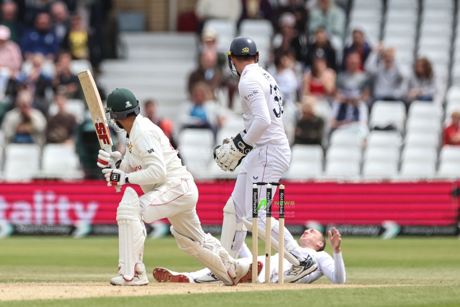 Sikandar Raza of Zimbabwe watches Harry Brook of England drop his ball during the Rothesay Test Match Day 3 England vs Zimbabwe at Trent Bridge, Nottingham, United Kingdom, 24th May 2025

(Photo by Mark Cosgrove/News Images)