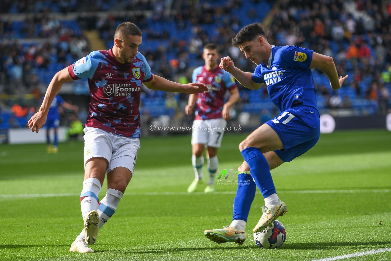 Callum O'Dowda #11 of Cardiff City  takes on Taylor Harwood-Belles #5 of Burnley during the Sky Bet Championship match Cardiff City vs Burnley at Cardiff City Stadium, Cardiff, United Kingdom, 1st October 2022

(Photo by Mike Jones/News Images)