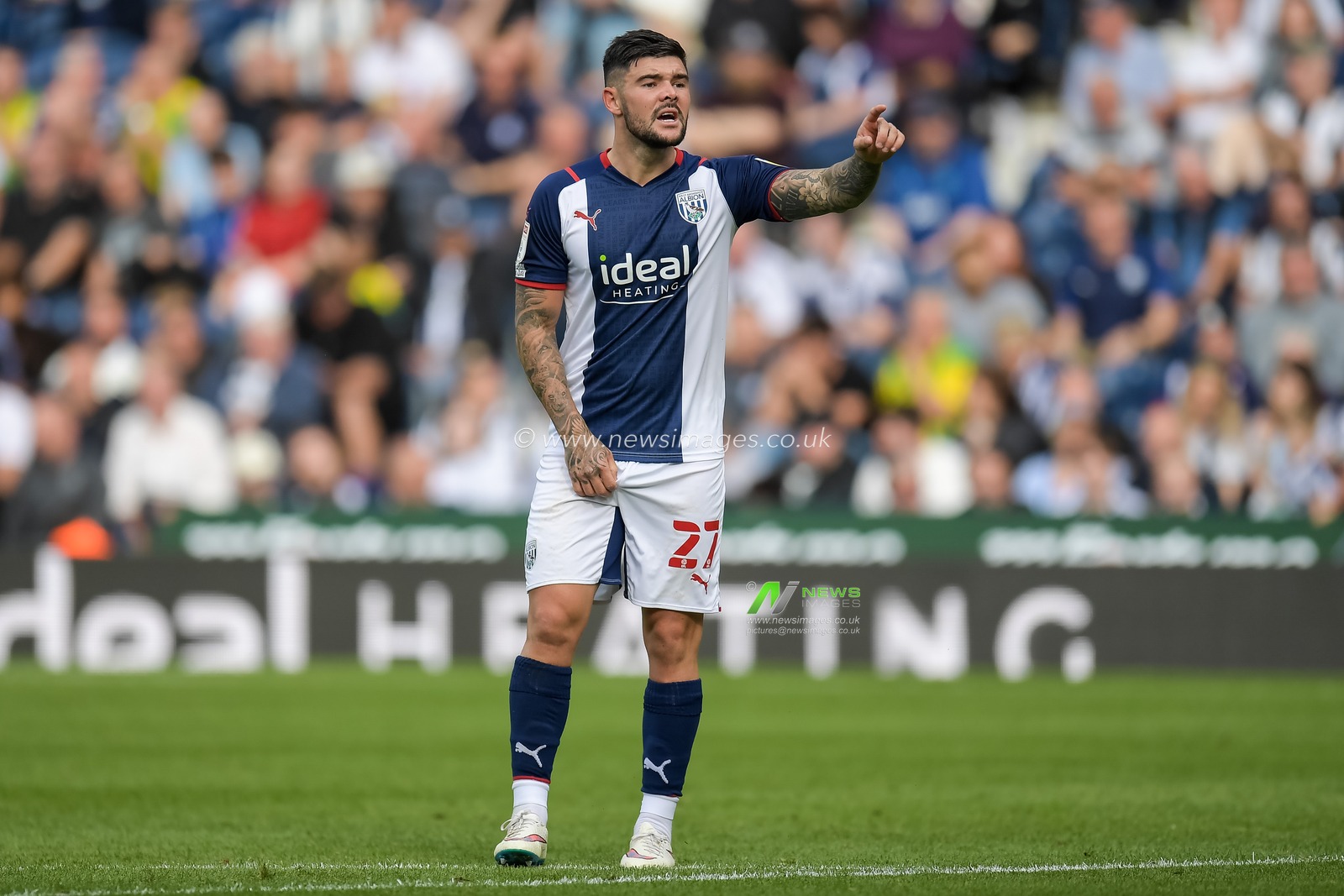Alex Mowatt #27 of West Bromwich Albion giving instructions