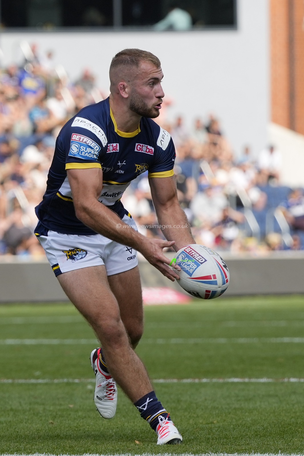 Jarrod Oâ€™Connor #14 of Leeds Rhinos passes the ball during the Betfred Super League Round 22 match Leeds Rhinos vs Warrington Wolves at Headingley Stadium, Leeds, United Kingdom, 20th August 2023

(Photo by Steve Flynn/News Images)