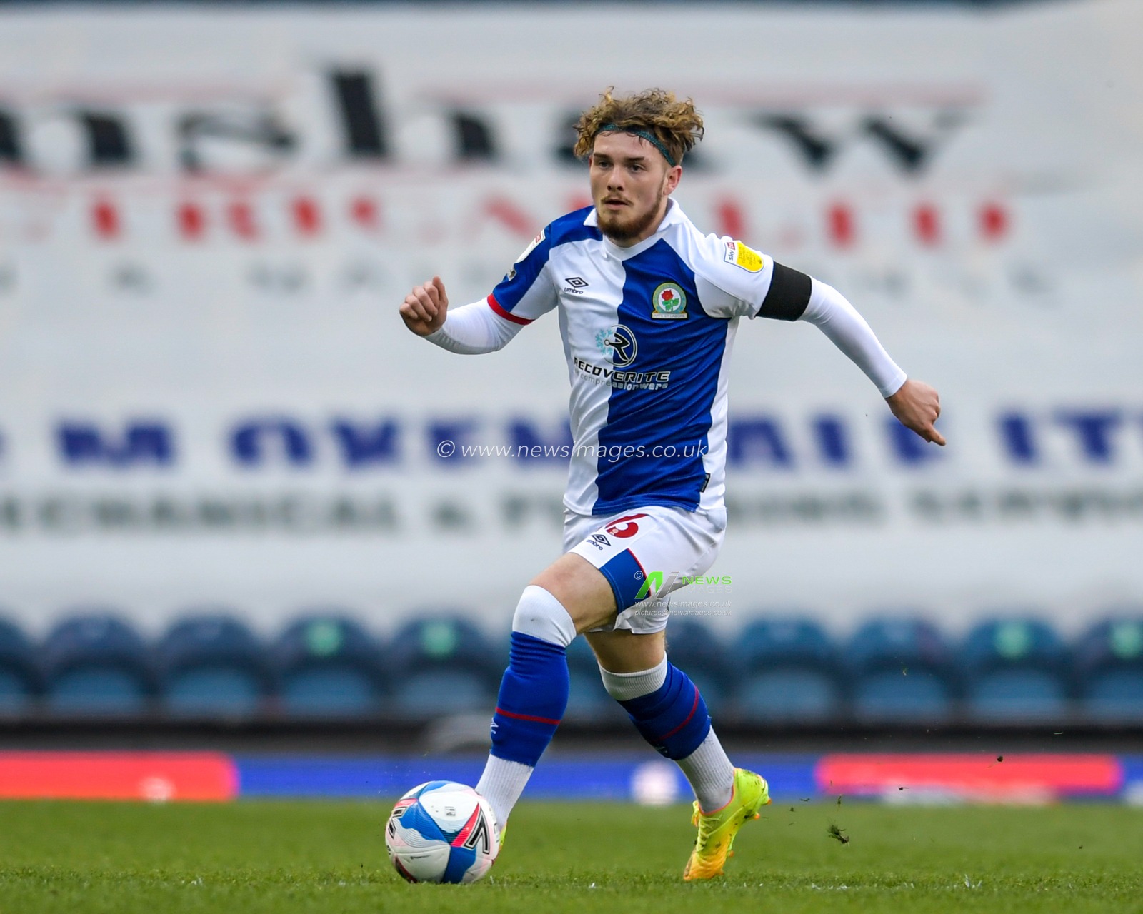Harvey Elliott #16 of Blackburn Rovers runs forward with the ball