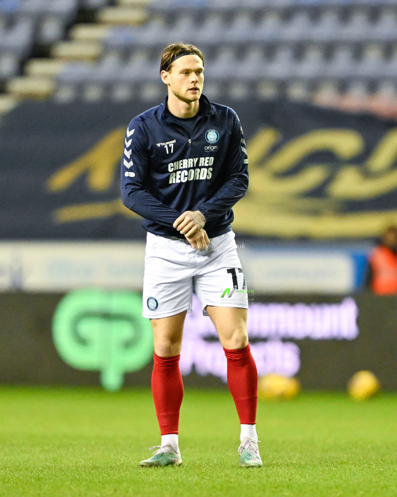 Joe Low of Wycombe Wanderers warms up ahead of the match, during the Sky Bet League 1 match Wigan Athletic vs Wycombe Wanderers at DW Stadium, Wigan, United Kingdom, 23rd January 2024

(Photo by Cody Froggatt/News Images)