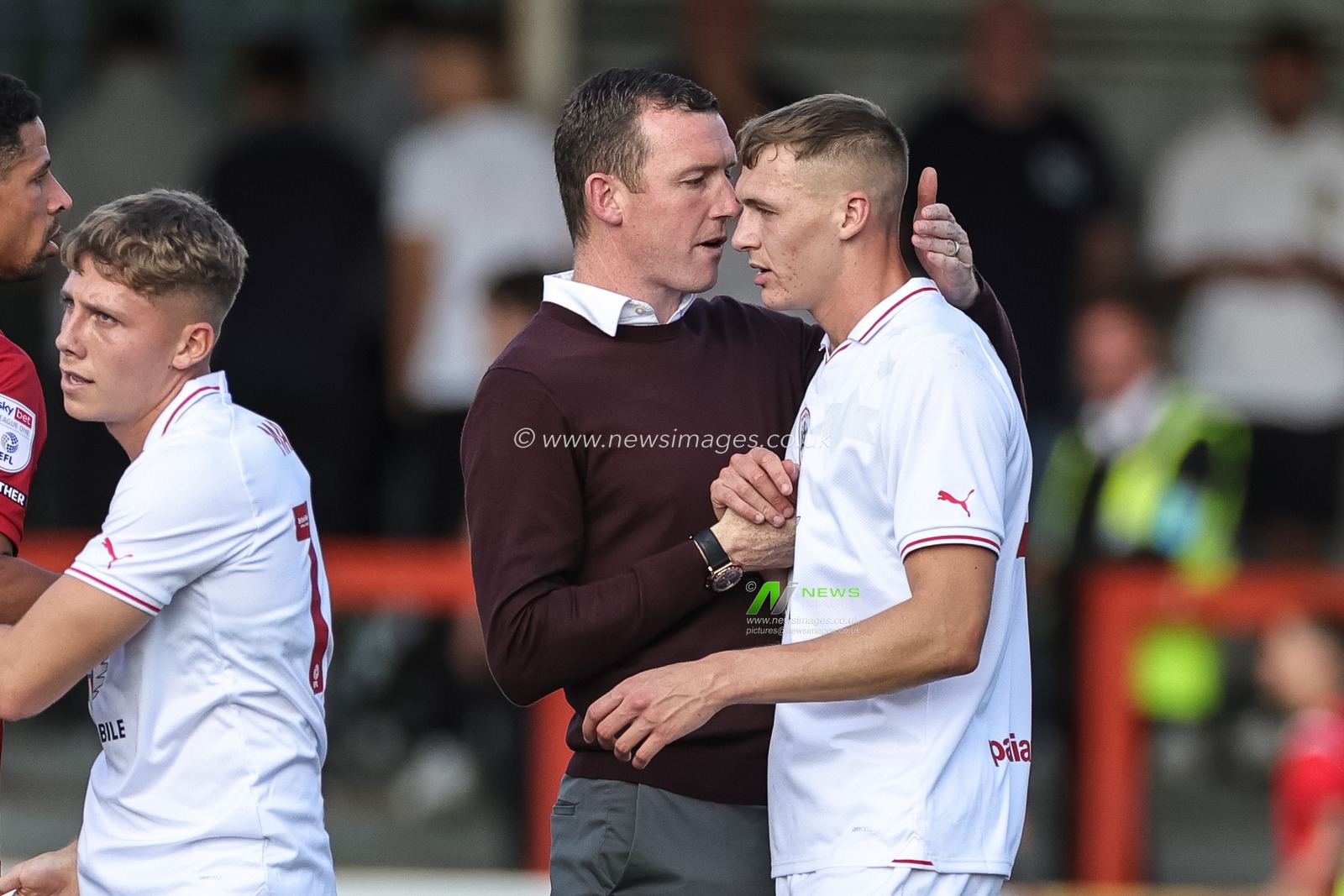 Neill Collins Head coach of Barnsley shakes hands with Jack Shepherd #41 of Barnsley during the Sky Bet League 1 match Cheltenham Town vs Barnsley at The Jonny-Rocks Stadium, Cheltenham, United Kingdom, 2nd September 2023

(Photo by Mark Cosgrove/News Images)