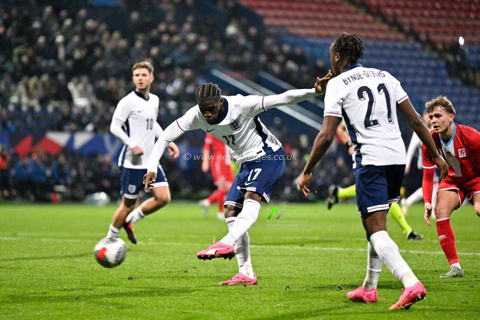 Samuel Iling-Junior of England strikes the ball to make it 2-0 England, during the UEFA Euro U21 Qualifiers Group F match England U21 vs Luxembourg U21 at Toughsheet Community Stadium, Bolton, United Kingdom, 26th March 2024

(Photo by Cody Froggatt/News Images)