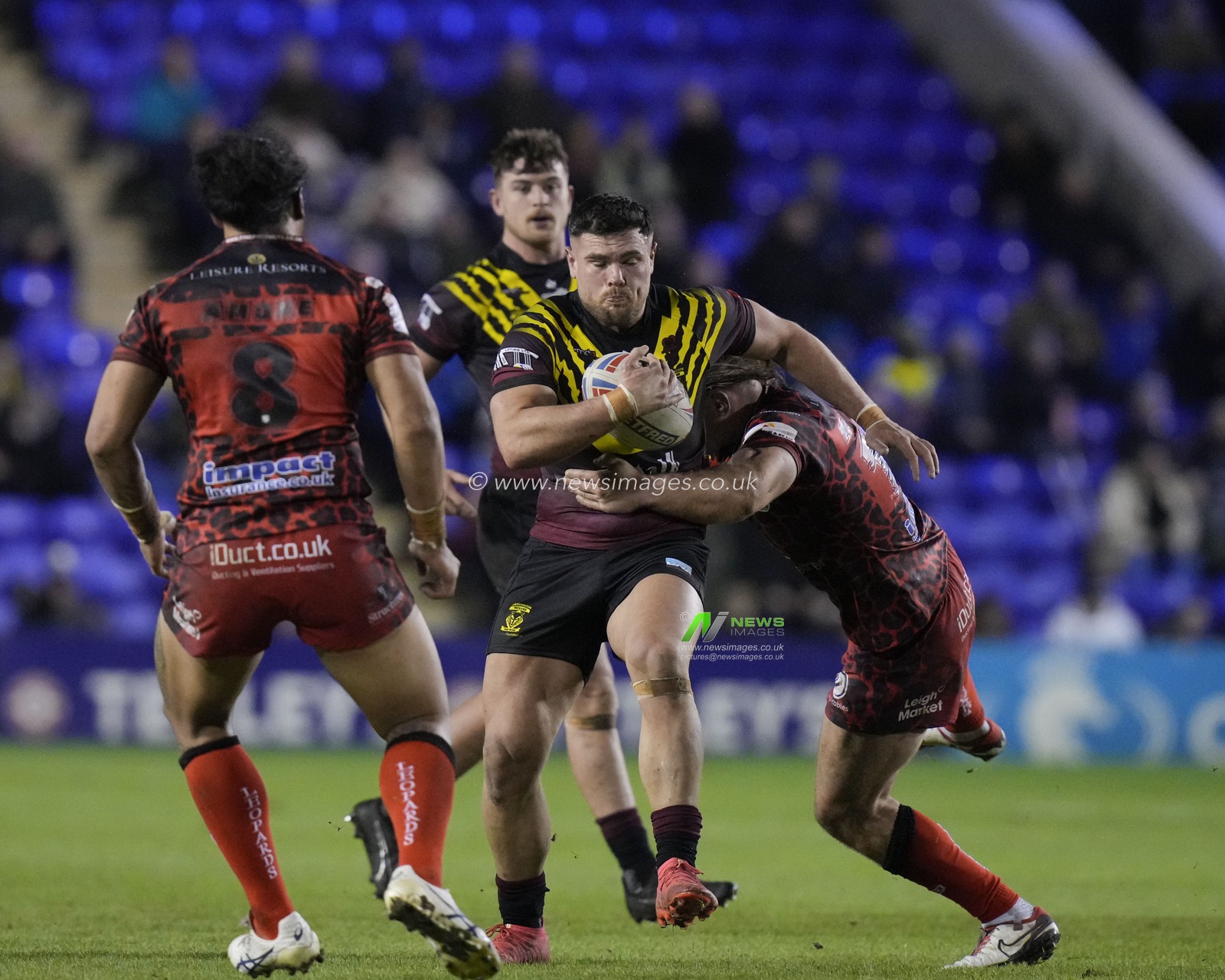 Joe Philbin of Warrington Wolves runs at the Leigh Leopards defence during the Rugby League Joe Philbin Testimonial match Warrington Wolves vs Leigh Leopards at Halliwell Jones Stadium, Warrington, United Kingdom, 3rd February 2024

(Photo by Steve Flynn/News Images)