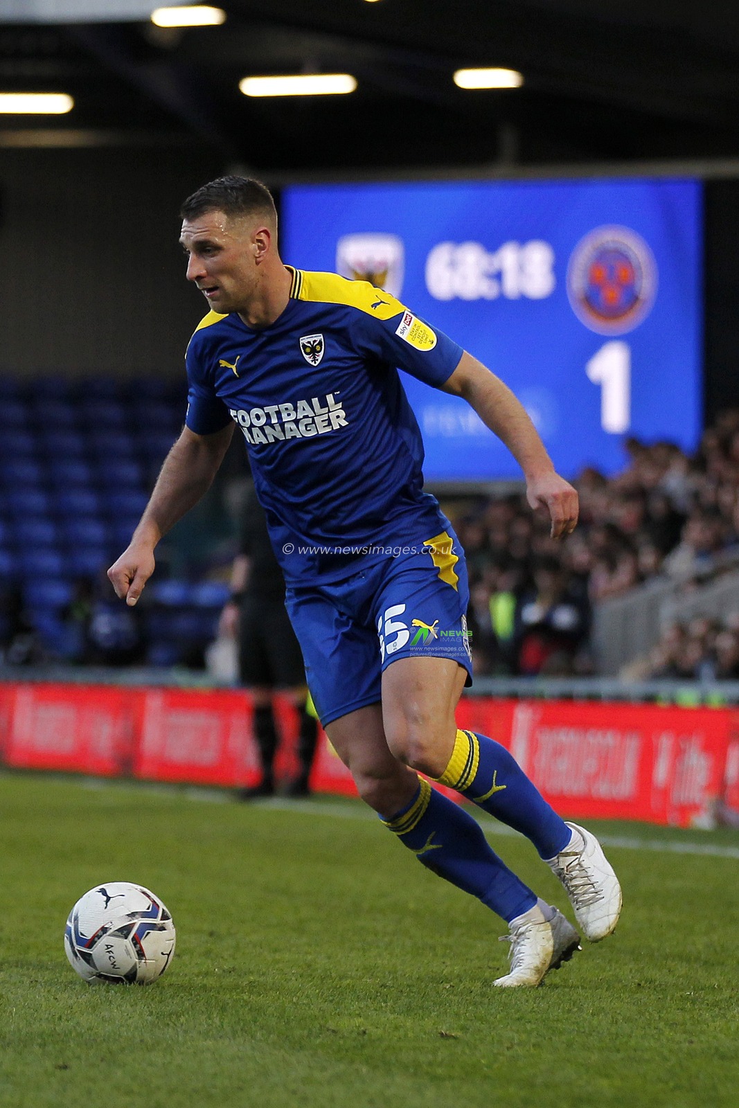Lee Brown of #55 of AFC Wimbledon on the ball