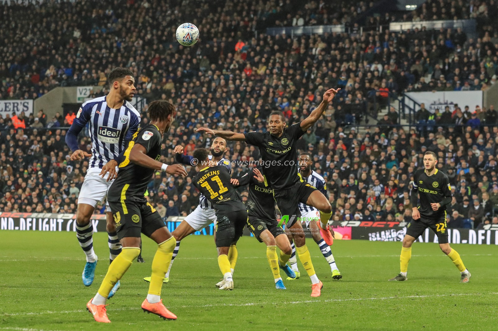 21st December 2019, The Hawthorns, West Bromwich, England; Sky Bet Championship, West Bromwich Albion v Brentford : Ethan Pinnock (5) of Brentford heads clear 

Credit: Mark Cosgrove/News Images