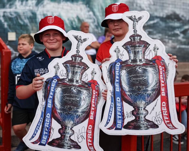 Two young Hull KR fans holding cutout of the Challenge Cup during the Betfred Super League Round 14 Hull KR vs Catalans Dragons at Sewell Group Craven Park, Kingston upon Hull, United Kingdom, 13th June 2025

(Photo by Mark Cosgrove/News Images)
