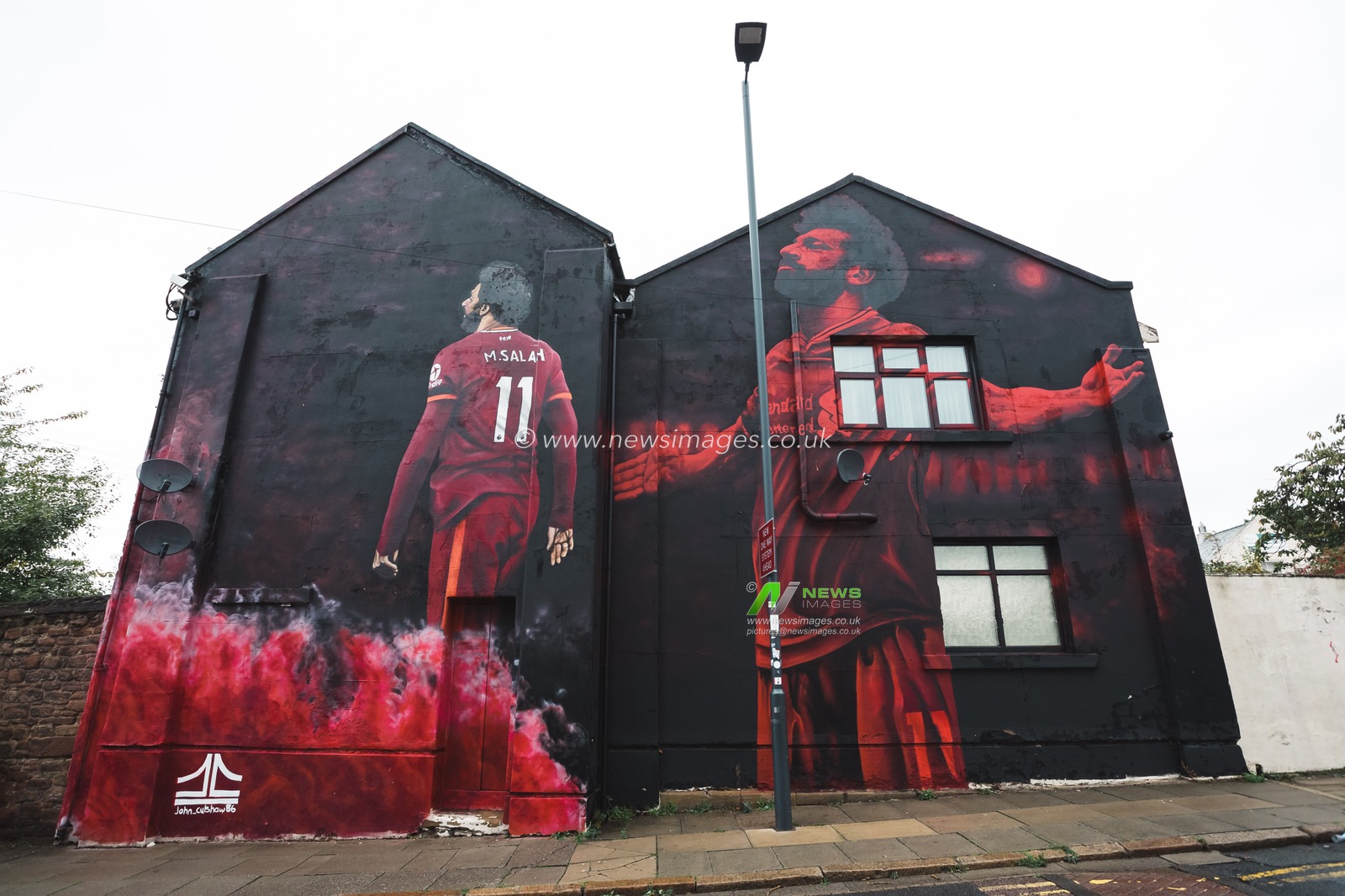 Mohamed Salah mural outside Anfield Stadium ahead of the UEFA Champions League match Liverpool vs Rangers at Anfield, Liverpool, United Kingdom, 4th October 2022

(Photo by James Heaton/News Images)