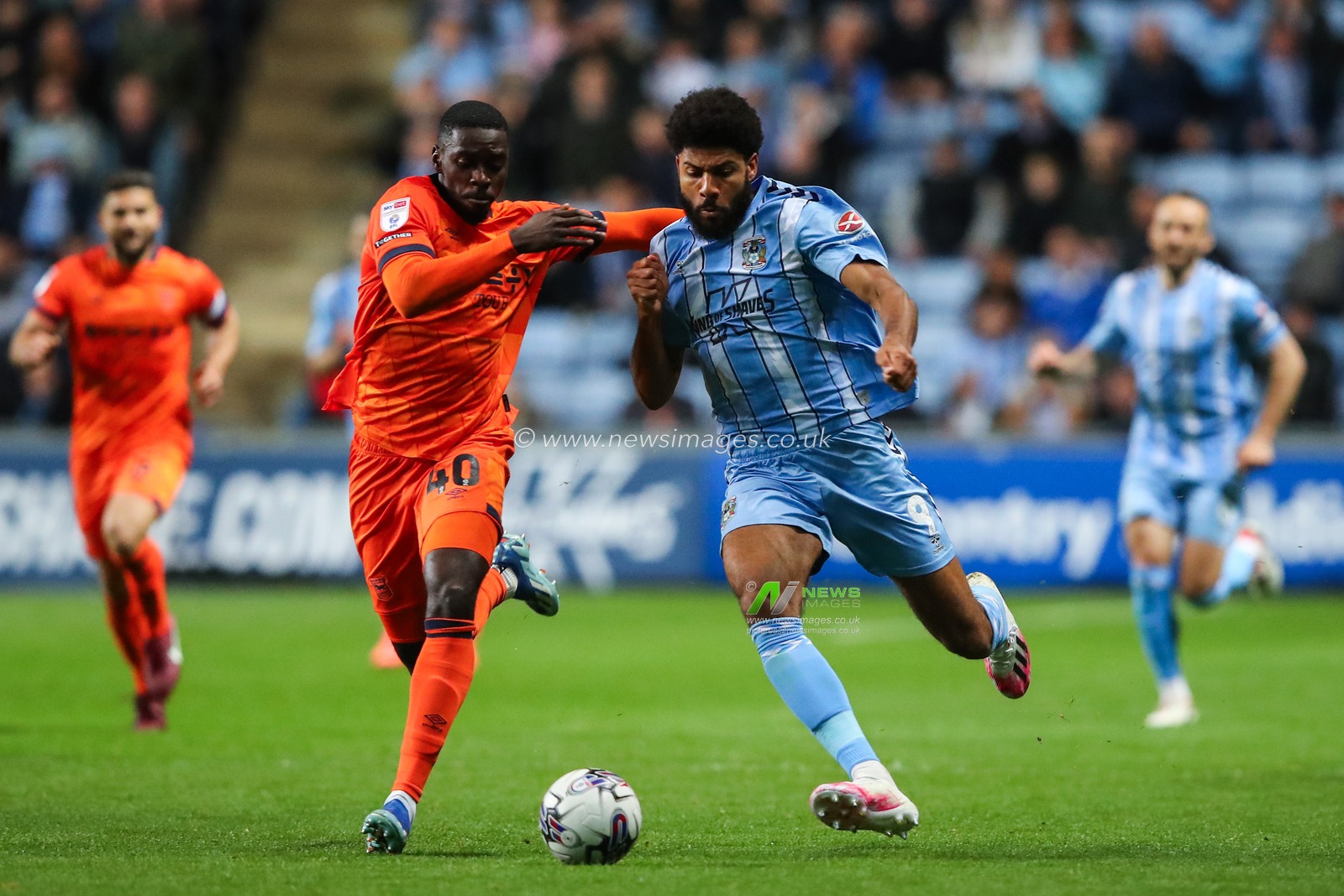 Axel Tuanzebe of Ipswich Town and Ellis Simms of Coventry City battle for the ball during the Sky Bet Championship match Coventry City vs Ipswich Town at Coventry Building Society Arena, Coventry, United Kingdom, 30th April 2024

(Photo by Gareth Evans/News Images)