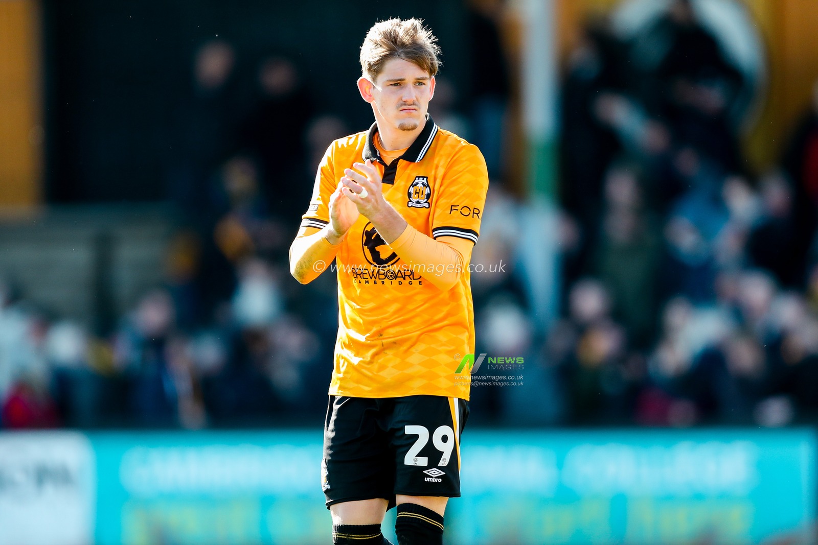 Dom Ballard of Cambridge United acknowledges the fans after the teams defeat following the Sky Bet League 1 match Cambridge United vs Peterborough United at Cledara Abbey Stadium, Cambridge, United Kingdom, 15th March 2025

(Photo by Izzy Poles/News Images)