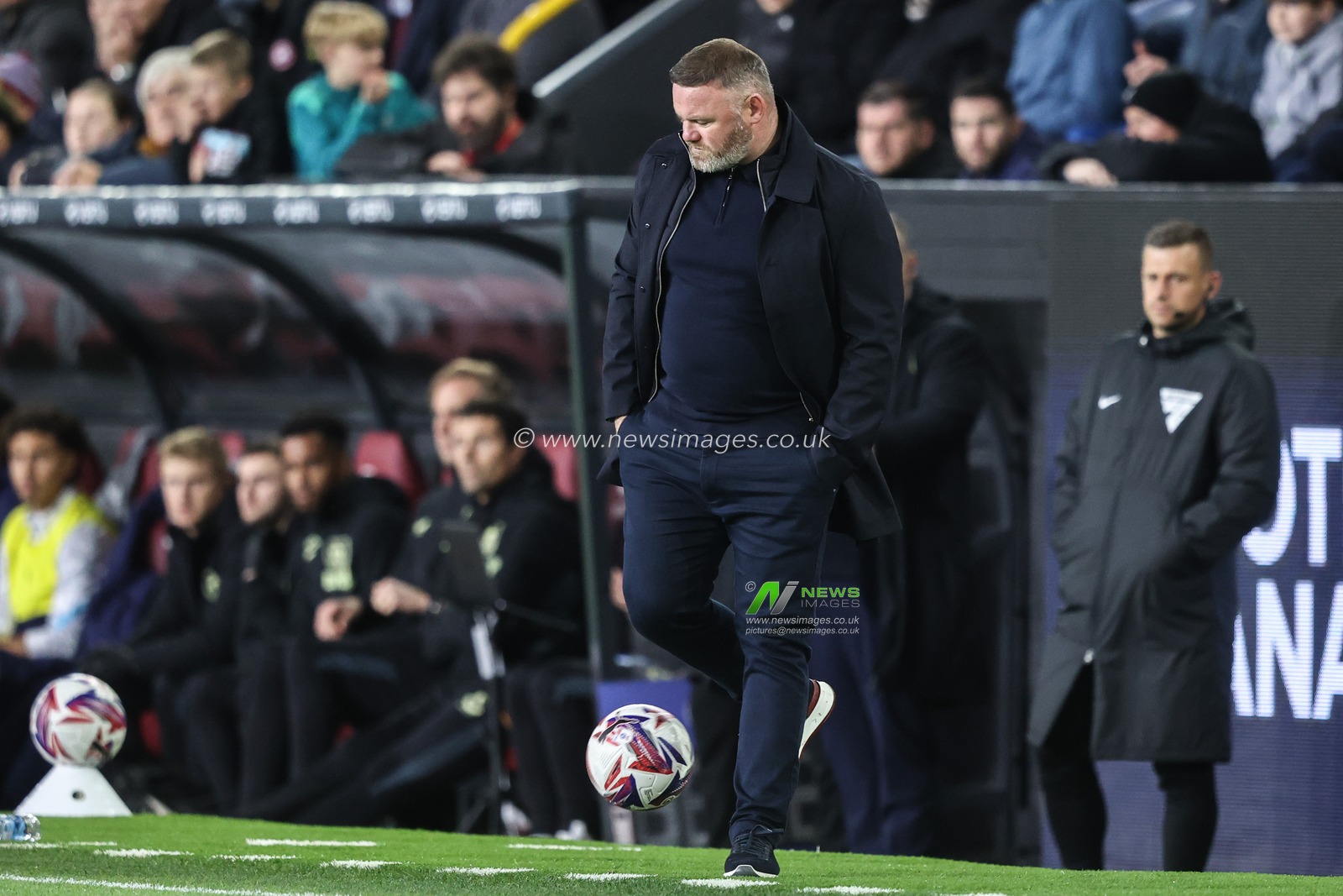 Wayne Rooney manager of Plymouth Argyle touches the ball as it rolls out of play during the Sky Bet Championship match Burnley vs Plymouth Argyle at Turf Moor, Burnley, United Kingdom, 1st October 2024

(Photo by Alfie Cosgrove/News Images)