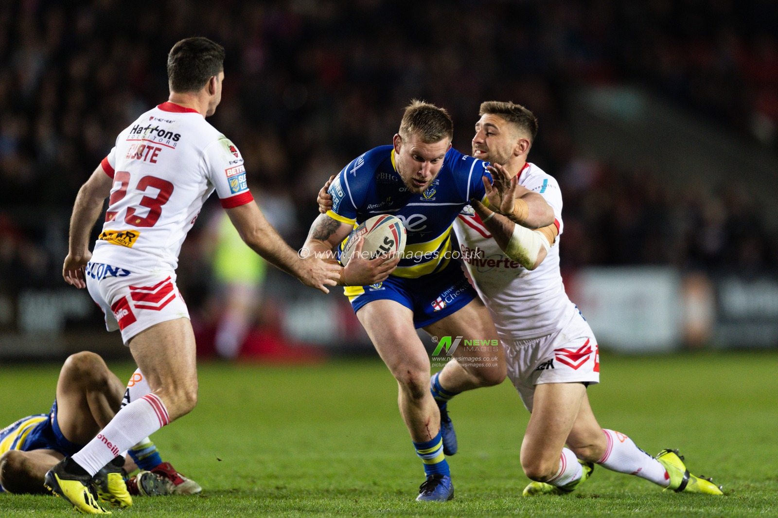 12th April 2019 , Totally Wicked Stadium, St Helens, England;  Betfred Super League, Round 10, St Helens vs Warrington Wolves,  Mike Cooper of Warrington Wolves is tackled by Tommy Makinson of St Helens 

Credit: Richard Long/News Images