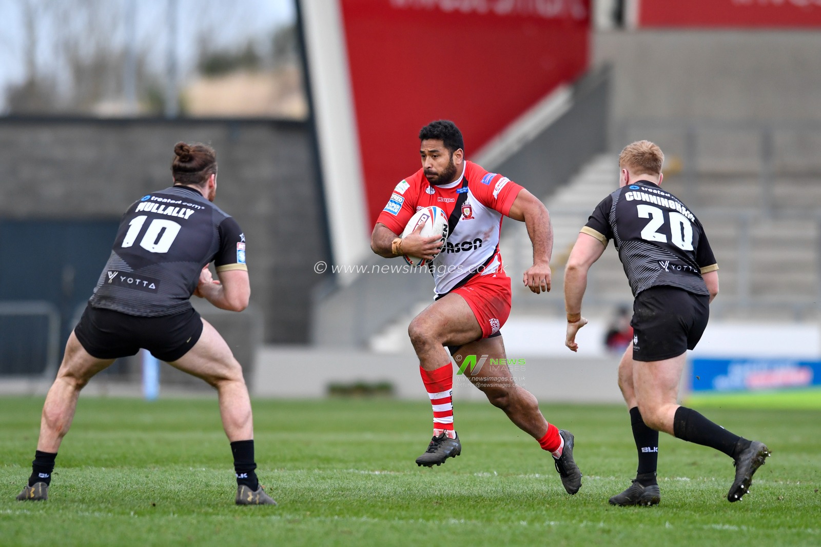 8th February 2020, AJ Bell Stadium, Eccles, England; Betfred Super League, Salford Red Devils v Toronto Wolfpack : Sebastine Ikahihifo (14) of Salford Red Devils runs forward with the ball