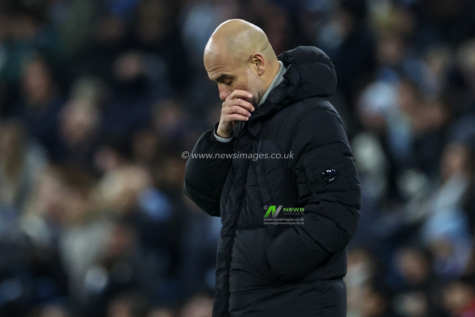 Pep Guardiola manager of Manchester City gathers his thoughts during the UEFA Champions League match Manchester City vs Feyenoord at Etihad Stadium, Manchester, United Kingdom, 26th November 2024

(Photo by Mark Cosgrove/News Images)