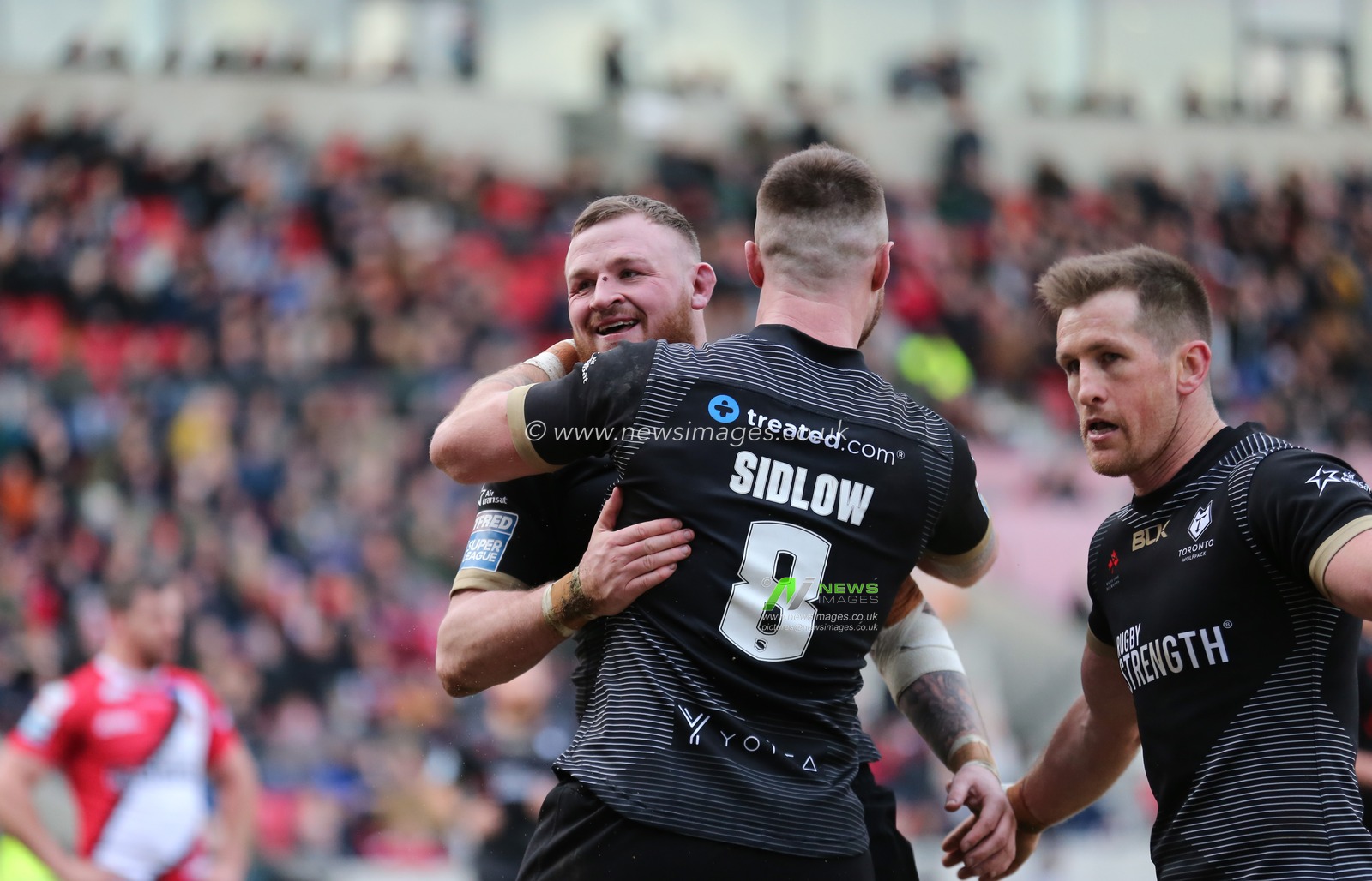 8th February 2020, AJ Bell Stadium, Eccles, England; Betfred Super League, Salford Red Devils v Toronto Wolfpack : Brad Singleton (L) of Toronto Wolfpack celebrates scoring his try against Salford Red Devils with his team mates.