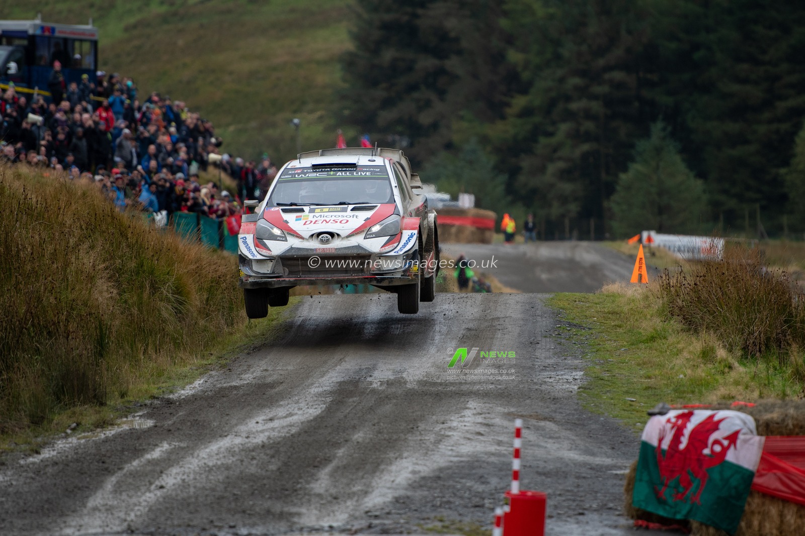 5th October 2019, Wales ; SS13 Sweet Lamb Hafren, Wales Rally GB 2019 Stage 13: Ott TANAK & Co Driver Martin JERVEOJA competing in the Toyota Yaris WRC for Toyota Gazoo Racing WRT takes flight off of the jump prior to the water splash

Credit: Gareth Dalley/News Images