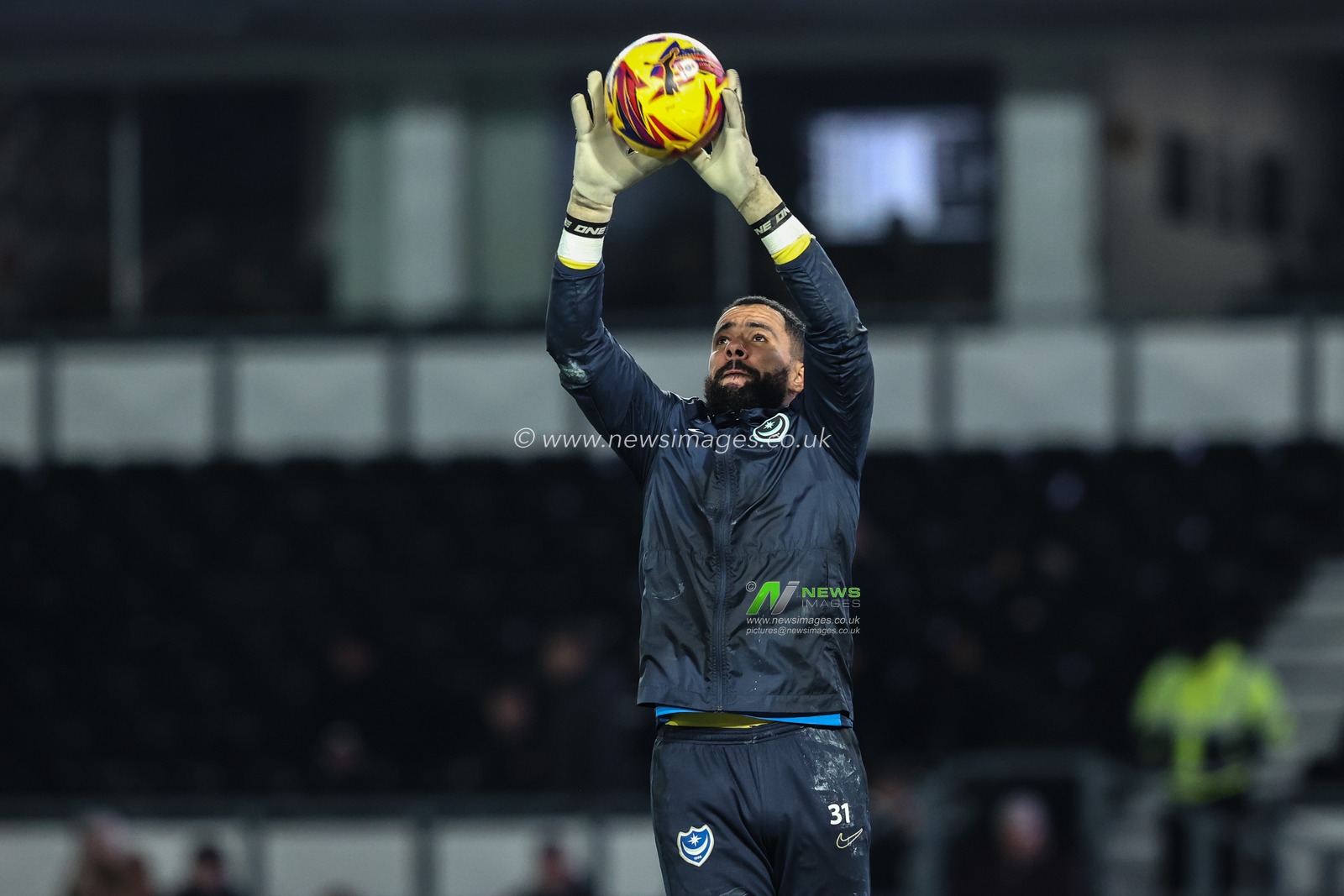Jordan Archer of Portsmouth in the pregame warmup session during the Sky Bet Championship match Derby County vs Portsmouth at Pride Park Stadium, Derby, United Kingdom, 13th December 2024

(Photo by Alfie Cosgrove/News Images)