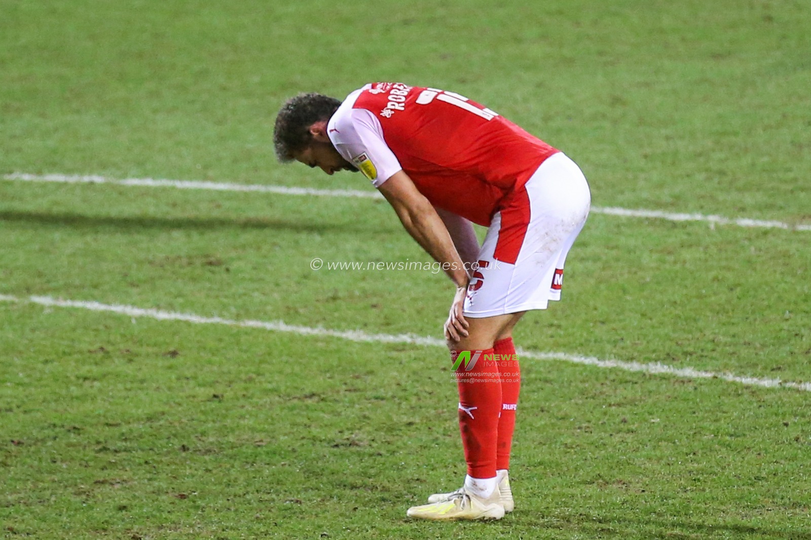 Clark Robertson #15 of Rotherham United dejected after the game