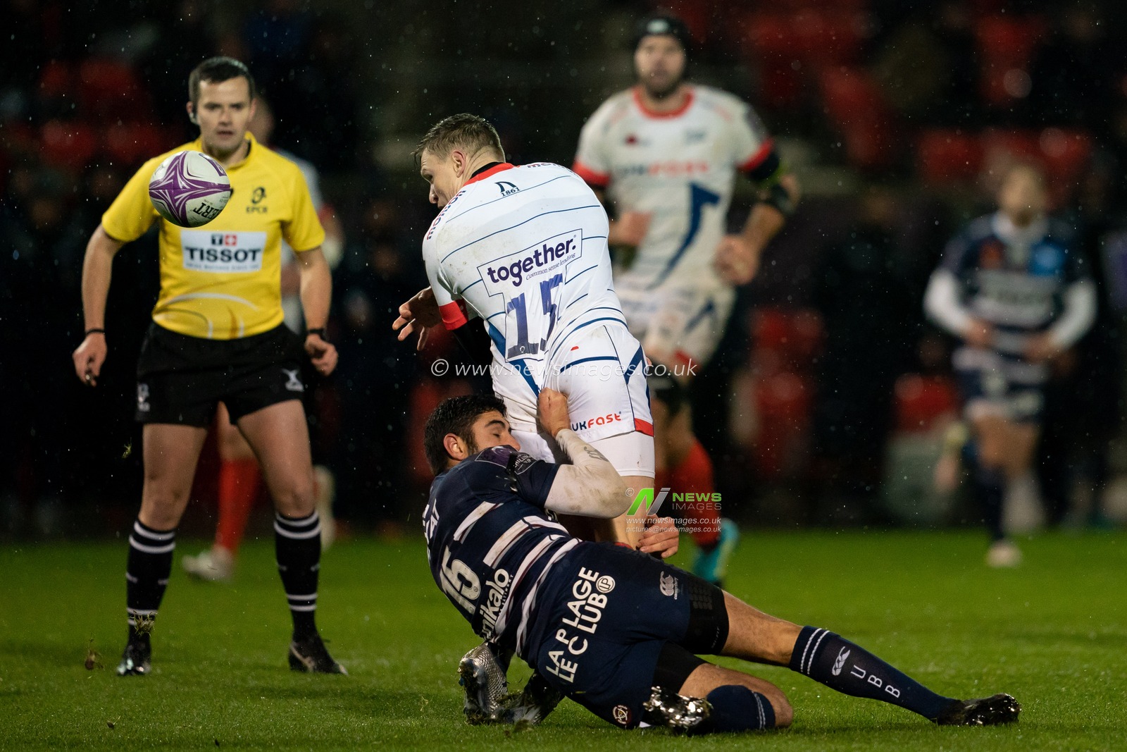 Sale Shark's Chris Ashton is tackled by  Bordeaux Belges's Roamian Buros 

15th December 2018, AJ Bell Stadium , Sale, England; European Rugby Challenge Cup, Sale v Bordeaux-Belges ; 

Credit: Terry Donnelly / News Images