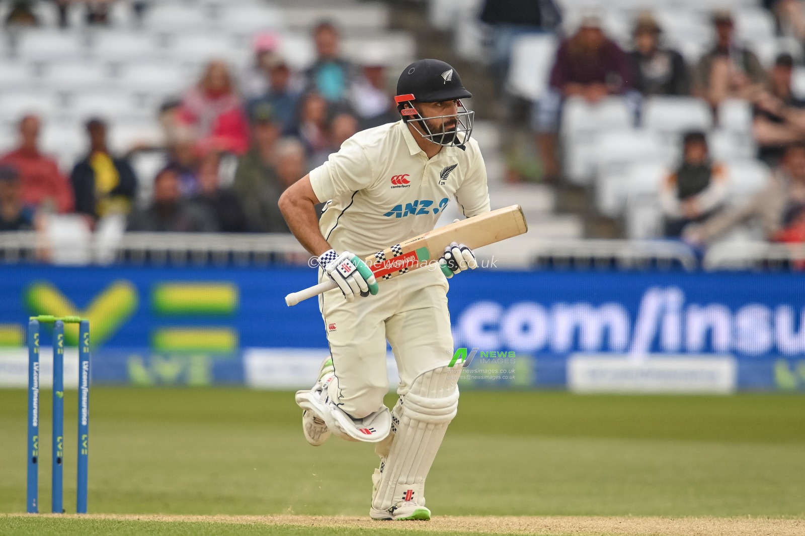 Daryl Mitchell of New Zealand makes one run