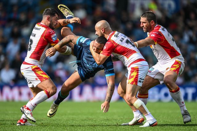 Elliot Minchella of Hull KR is tackled by Ben Garcia of Catalan Dragons and Alrix Da Costa of Catalan Dragons during the Magic Weekend match Catalans Dragons vs Hull KR at Elland Road, Leeds, United Kingdom, 18th August 2024

(Photo by Craig Thomas/News Images)