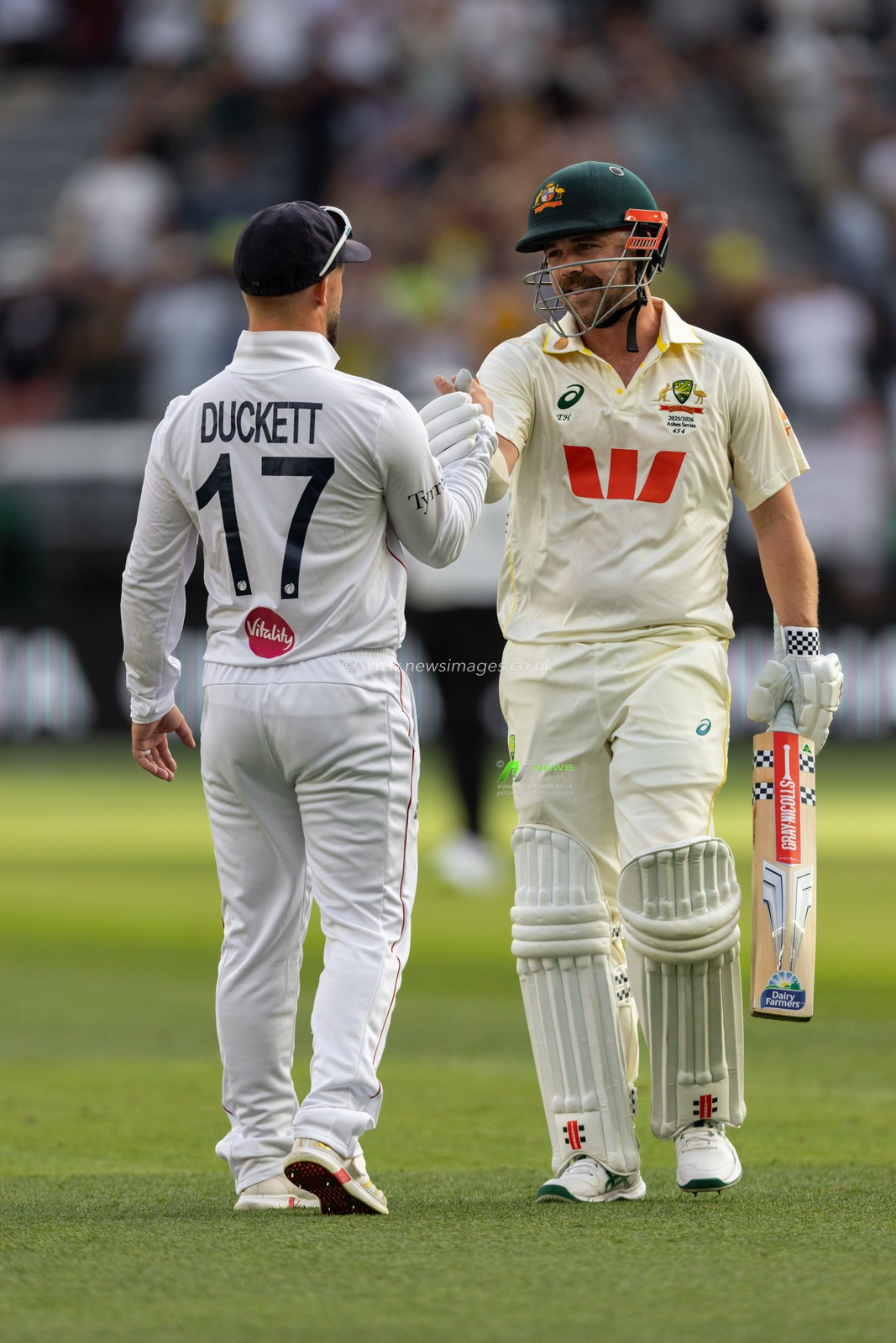 Travis Head of Australia is congratulated by Ben Duckett of England for a brilliant innings after he got out during the NRMA Insurance Ashes First Test Day 2 Australia vs England at Optus Stadium, Perth, Australia, 22nd November 2025

(Photo by Santanu Banik/News Images)

*** GER AUT SUI OUT ***