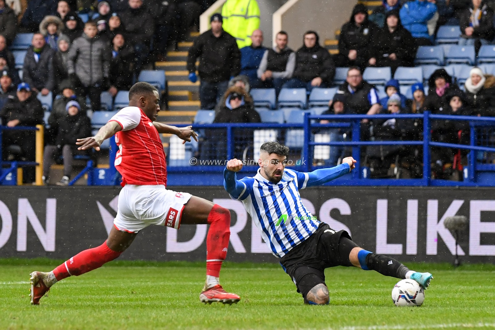 Callum Paterson #13 of Sheffield Wednesday attempts to cross the ball
