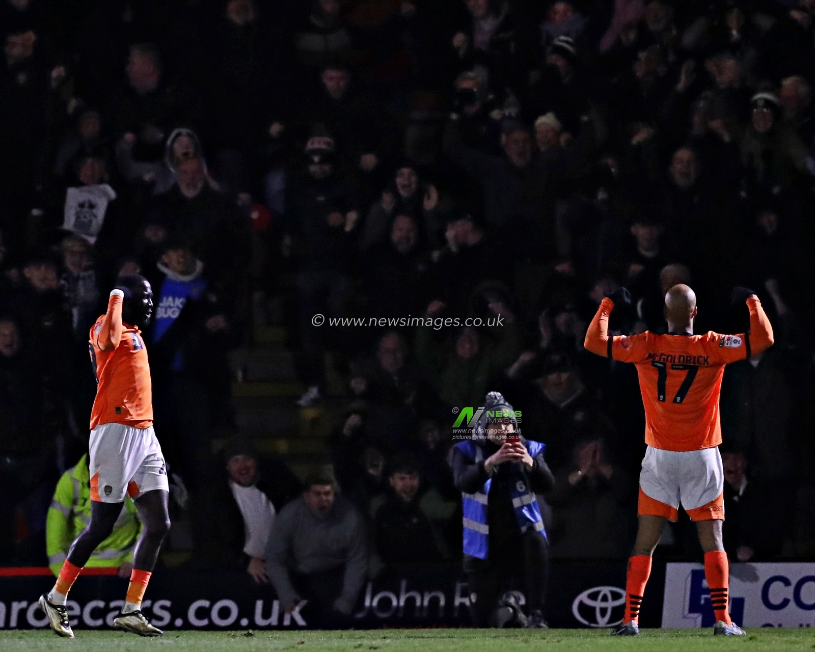 David McGoldrick of Notts County celebrates his goal in front of the away fans during the Sky Bet League 2 match Grimsby Town vs Notts County at Blundell Park, Cleethorpes, United Kingdom, 11th March 2025

(Photo by Sam Eaden/News Images)