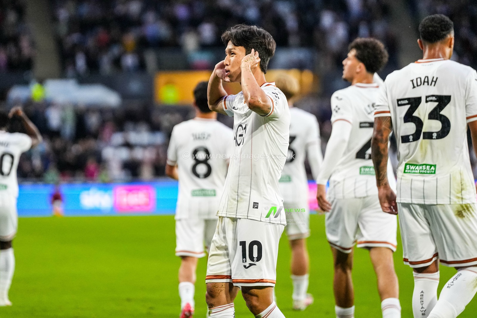 Eom Ji-Sung of Swansea City celebrates scoring his teams first goal during the Sky Bet Championship match Swansea City vs Watford at Swansea.com Stadium, Swansea, United Kingdom on 01 September 2026

(Photo by Andrew Lewis/News Images)