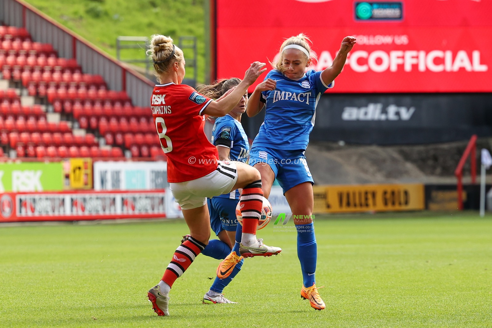 Charlie Estcourt  #18 of Birmingham City and Emily Simpkins #8 of Charlton Athletic compete for the ball during the The Fa Women's Super 2 League match Chalrton Women vs Birmingham City Women at The Oakwood VCD Athletic, Charlton, United Kingdom, 18th September 2022

(Photo by Simon Bissett/News Images)