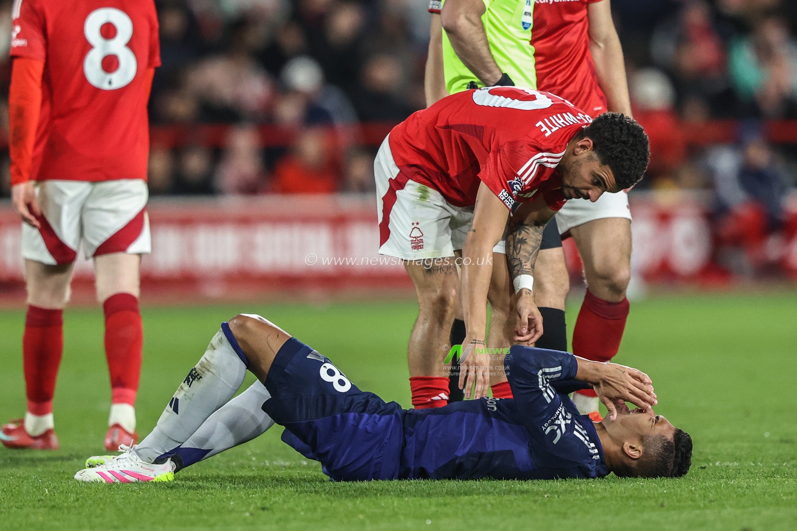 Morgan Gibbs-White of Nottingham Forest checks on Casemiro of Manchester United after they collide in a challenge during the Premier League match Nottingham Forest vs Manchester United at City Ground, Nottingham, United Kingdom, 1st April 2025

(Photo by Alfie Cosgrove/News Images)