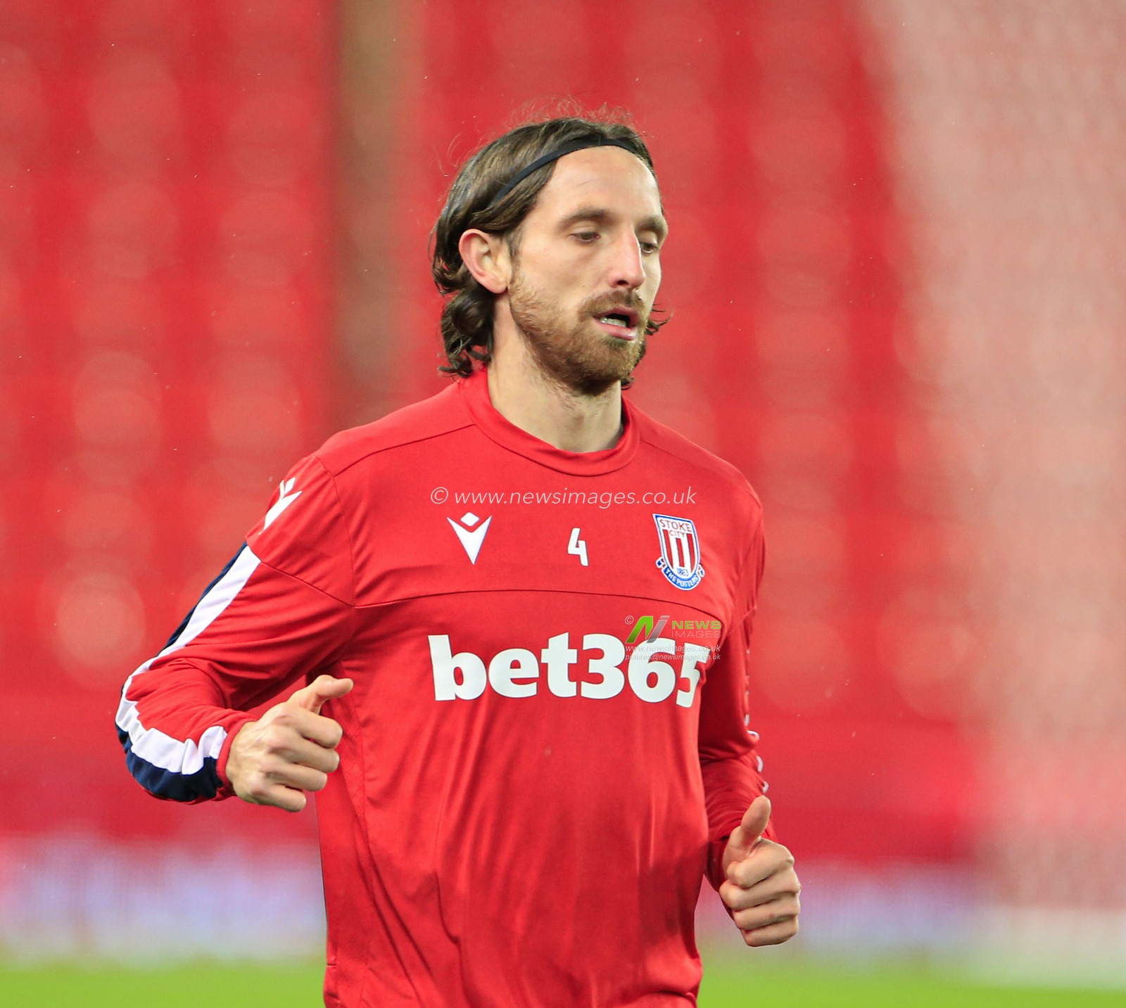 10th December 2019, Bet365 Stadium, Stoke-on-Trent, England; Sky Bet Championship, Stoke City v Luton Town : Joe Allen (4) of Stoke City warms up for the game

Credit: Conor Molloy/News Images
