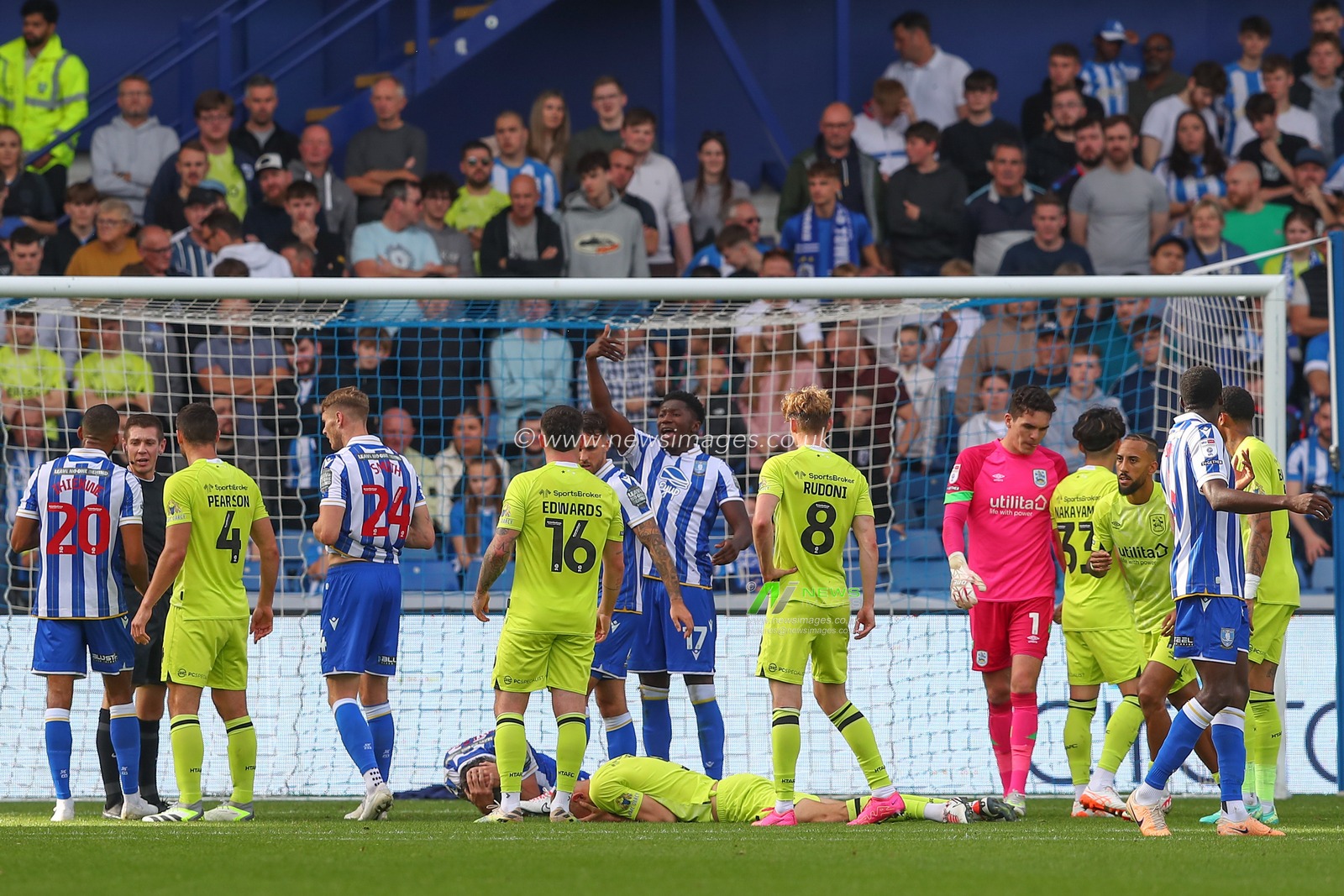 Michal Helik #5 of Huddersfield Town goes down injured after a clash of heads with Callum Paterson #13 of Sheffield Wednesday during the Sky Bet Championship match Sheffield Wednesday vs Huddersfield Town at Hillsborough, Sheffield, United Kingdom, 7th October 2023

(Photo by Gareth Evans/News Images)