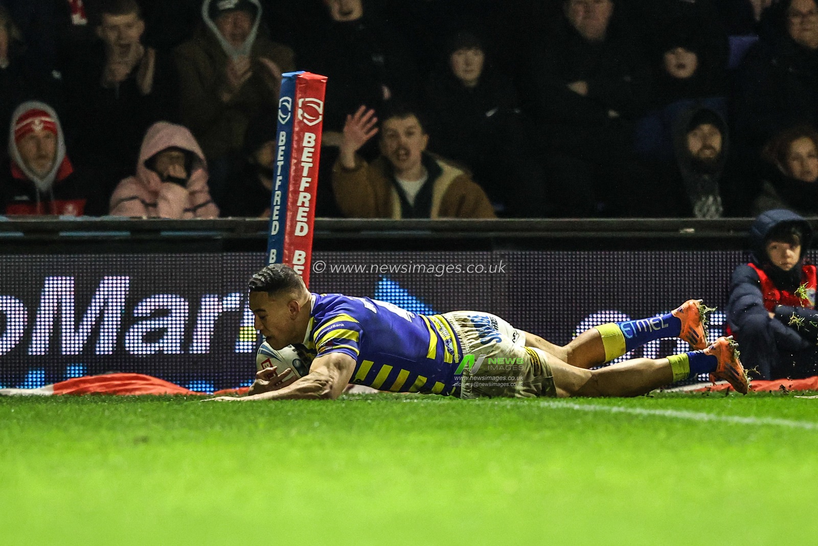 Albert Hopoate of Warrington Wolves goes over for a try during the Betfred Super League Round 1 match Warrington Wolves vs St Helens at The Halliwell Jones Stadium, Warrington, United Kingdom on 13 February 2026

(Photo by Alfie Cosgrove/News Images)