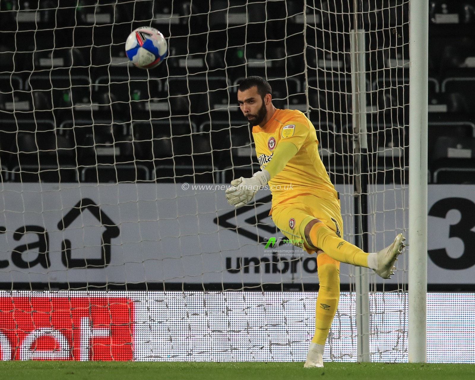 David Raya #1 of Brentford kicks the ball out